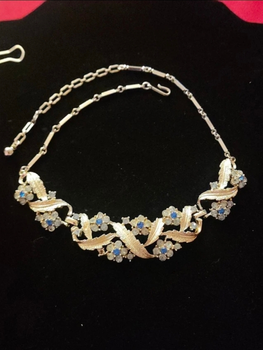 Vintage Mid Century Silver Tone Floral and Leafy Motif with Blue Rhinestones 16"